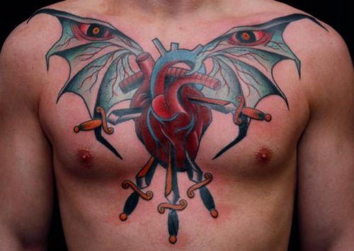 Devil Winged Human Heart Illuminati Eye Tattoo On Man Chest